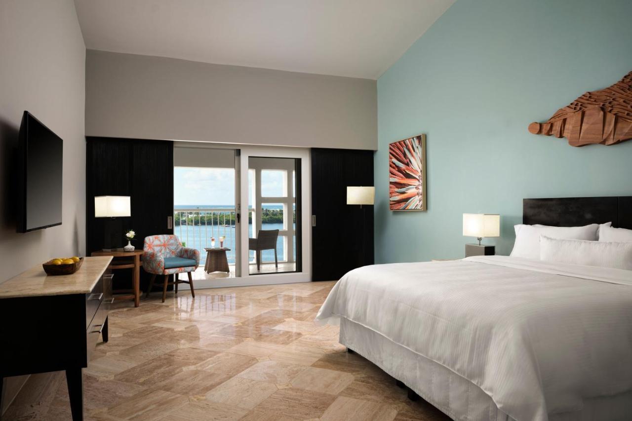 Deluxe King Room with Balcony and Lagoon View,1649017498:JPEG